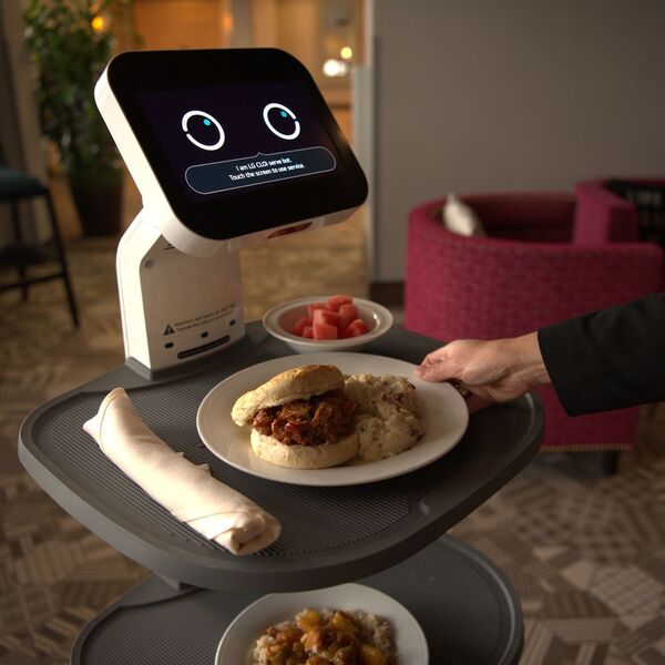 CLOi waiter robot serving restaurant guests